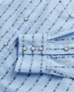 Closeup detail view of Men's Vintage Weight Pearl Snap LS - Chambray / Storm