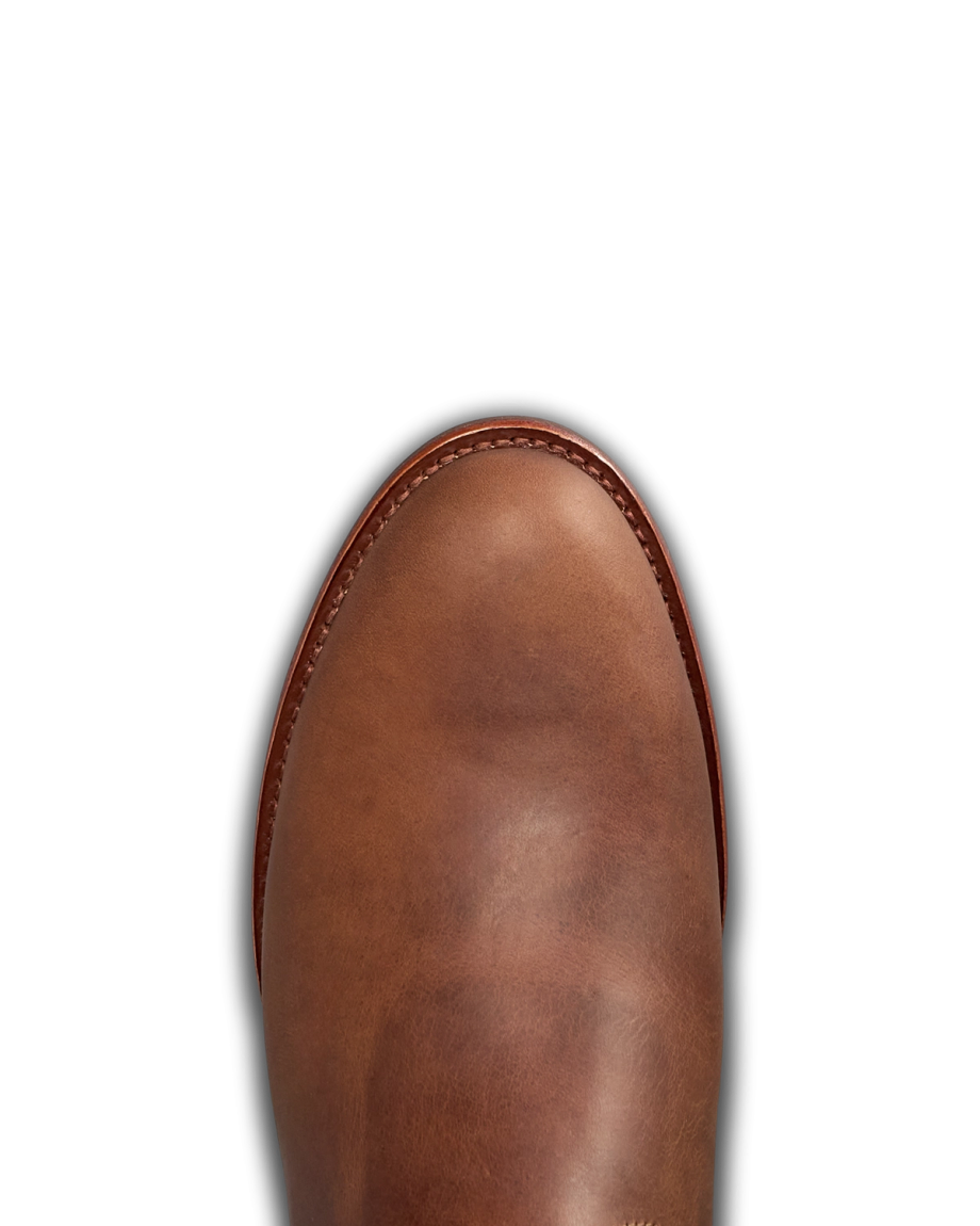 Toe view of The Glen - Light Molasses Cowhide on plain background