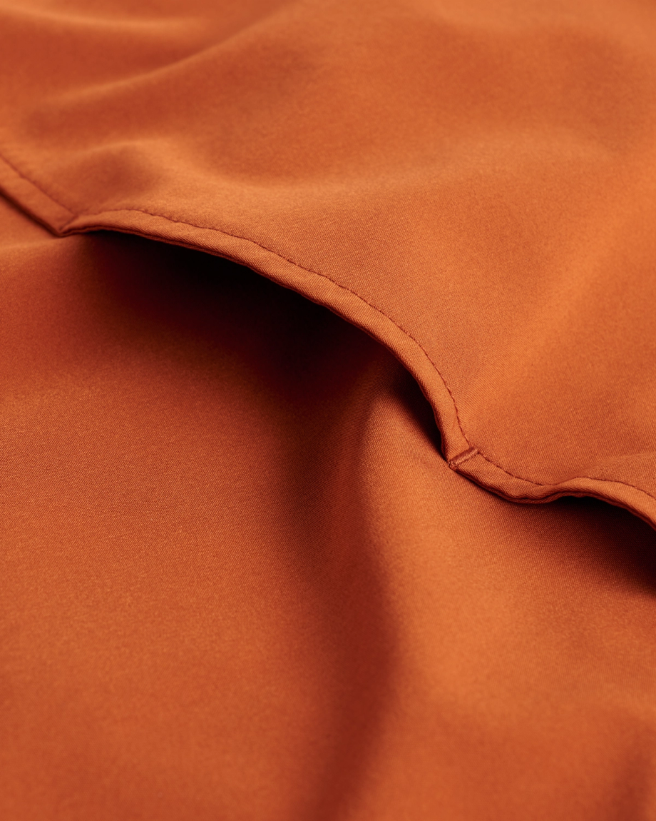Closeup detail view of Men's Performance Western Pearl Snap - Burnt Orange
