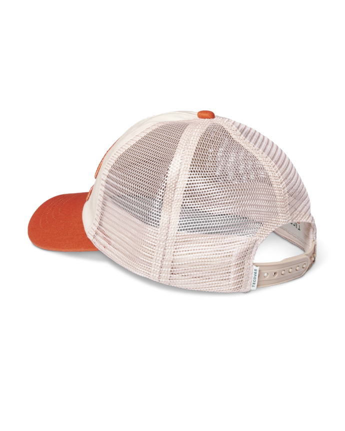 Quarterback view of Tecovas Western Goods Patch Trucker Hat - White / Orange on plain background