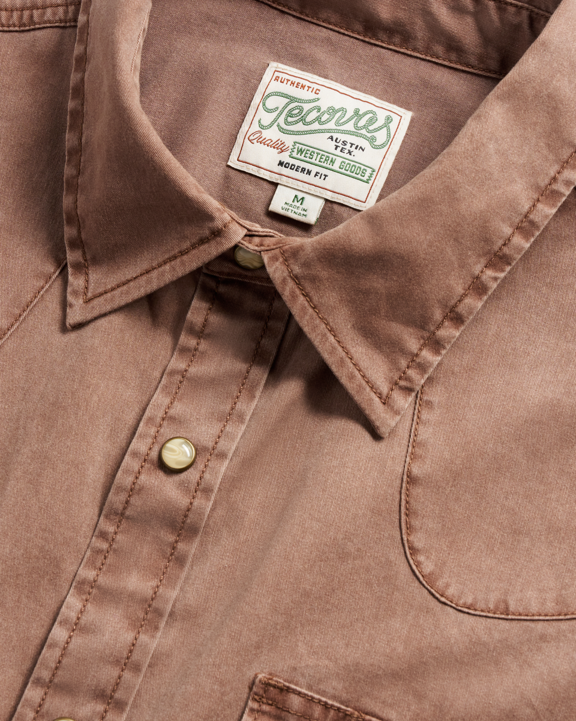 Closeup detail view of Men's Thorn Stopper Pearl Snap LS - Brown