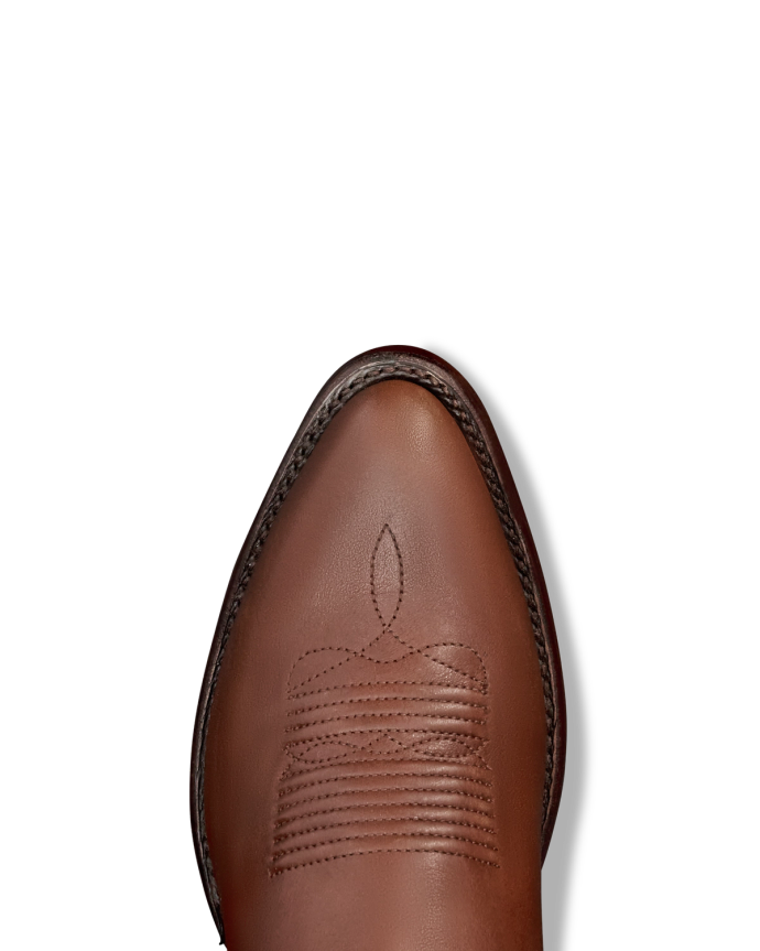 Toe view of The Jane - Saddle Suede on plain background