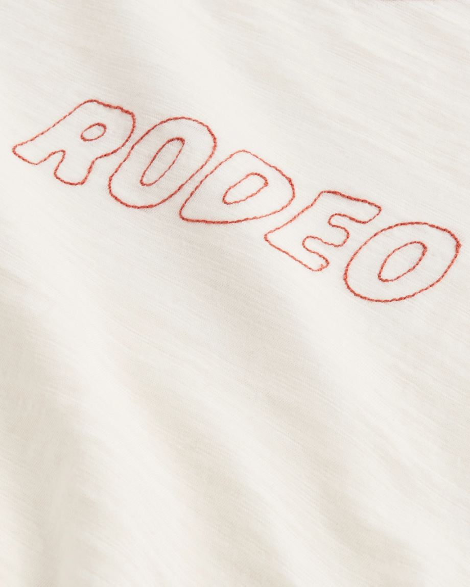 Closeup detail view of Women's Vintage Ringer Tee - Bone/Ginger Spice