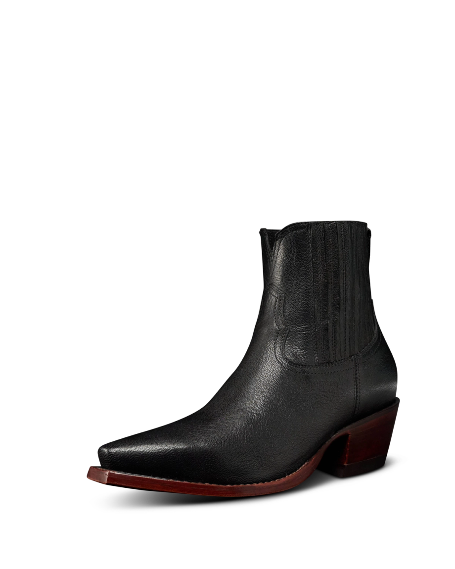 Quarterfront view of The Piper II - Midnight Goat on plain background