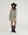 Full view of Women's L/S Mini Dress - Cream / Black on model