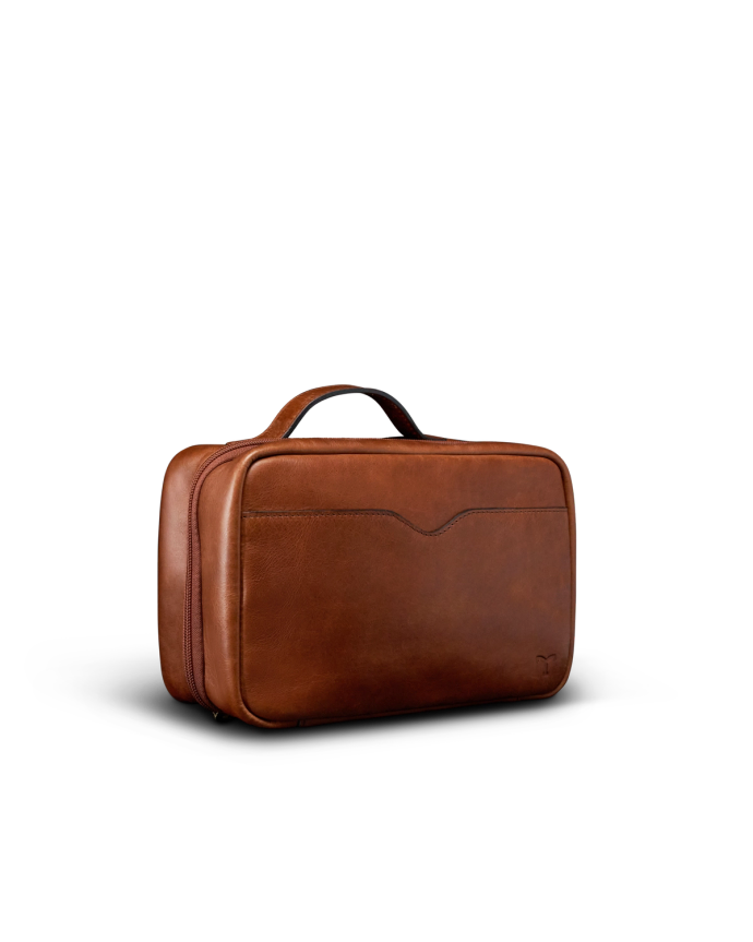 Quarterfront view of Bartlett Hanging Travel Kit - Cognac on plain background