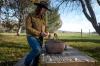 man at a picnic table