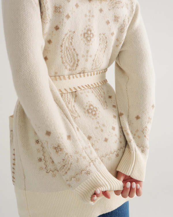 Closeup detail view of Women's Shawl Collar Wrap Sweater - Cream / Tan