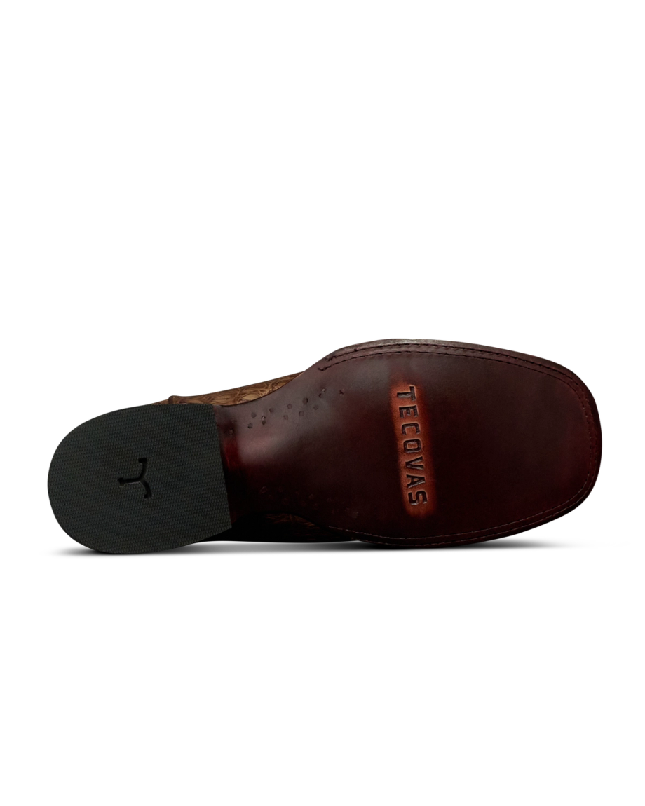 Sole view of The William - Toffee/Navy Caiman on plain background