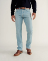 Front view of Men's Slim Straight Stretch Denim - Light Stone Wash on model