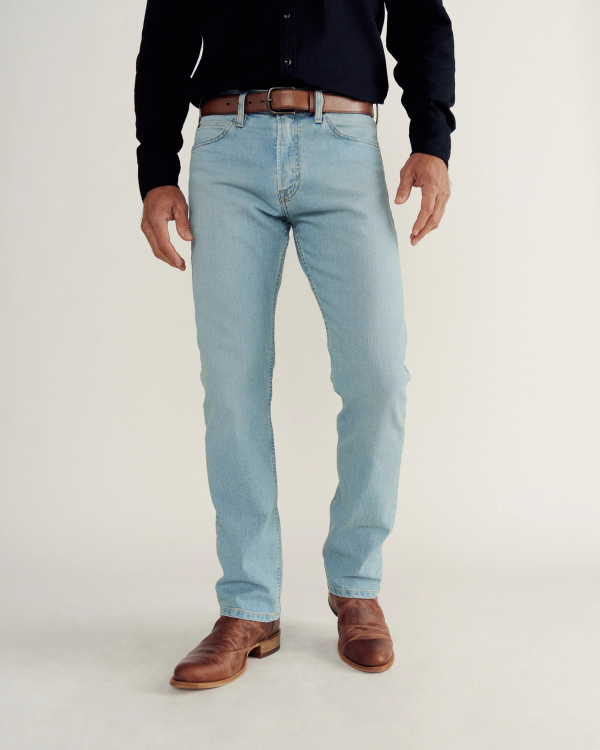Front view of Men's Slim Straight Stretch Denim - Light Stone Wash on model