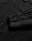 Closeup detail view of Men's Sawtooth Pearl Snap Shacket - Black