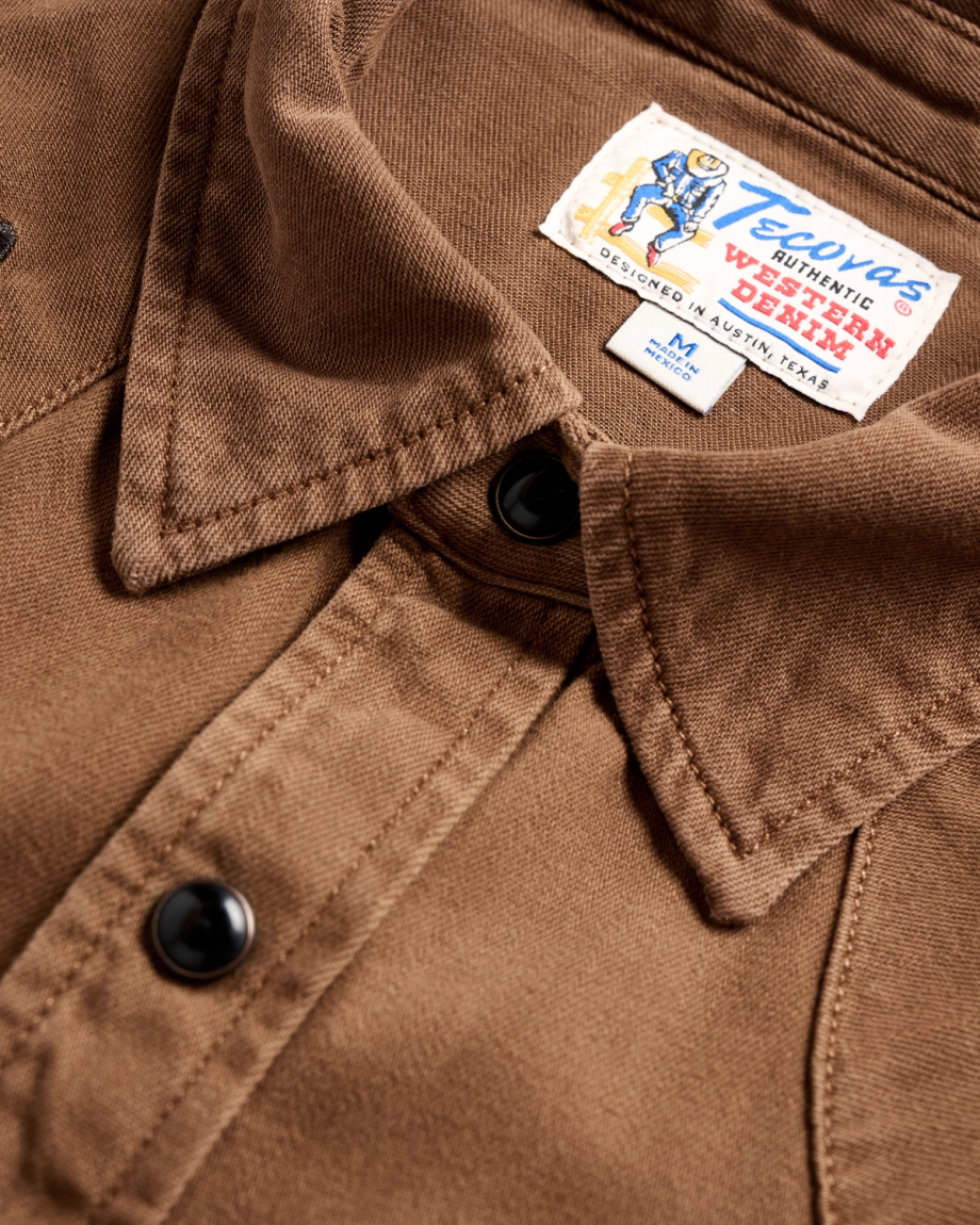 Closeup detail view of Men's Denim Pearl Snap - Tobacco