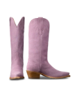 The Annie in Lavender Suede. Pair of tall, light purple Annie Suede cowboy boots with pointed toes, wooden heels, and decorative stitching, shown from side and front angles on a white background.