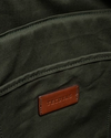 Closeup view of Waxed Canvas Commuter Tote / Moss - Moss
