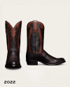 Two-tone brown leather western boots with decorative stitching.