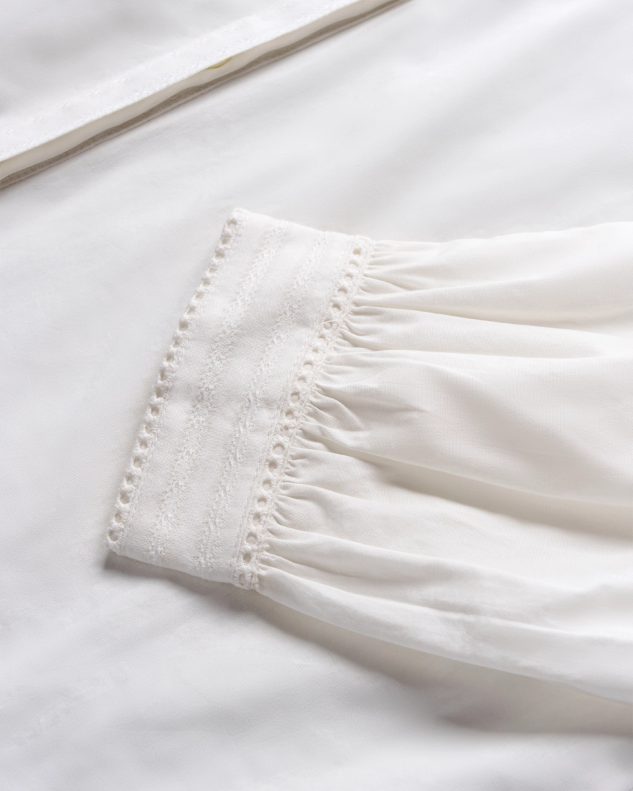 Closeup view of Women's Lace Peasant Top - White