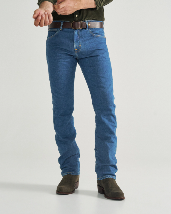 Front view of Men's Slim Straight Heritage Denim - Medium Blue on model