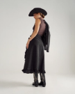 Back view of Women's Rodeo Maxi Denim Skirt - Black on model