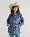 Front view of Women's Denim Chore Jacket - Medium Wash on model