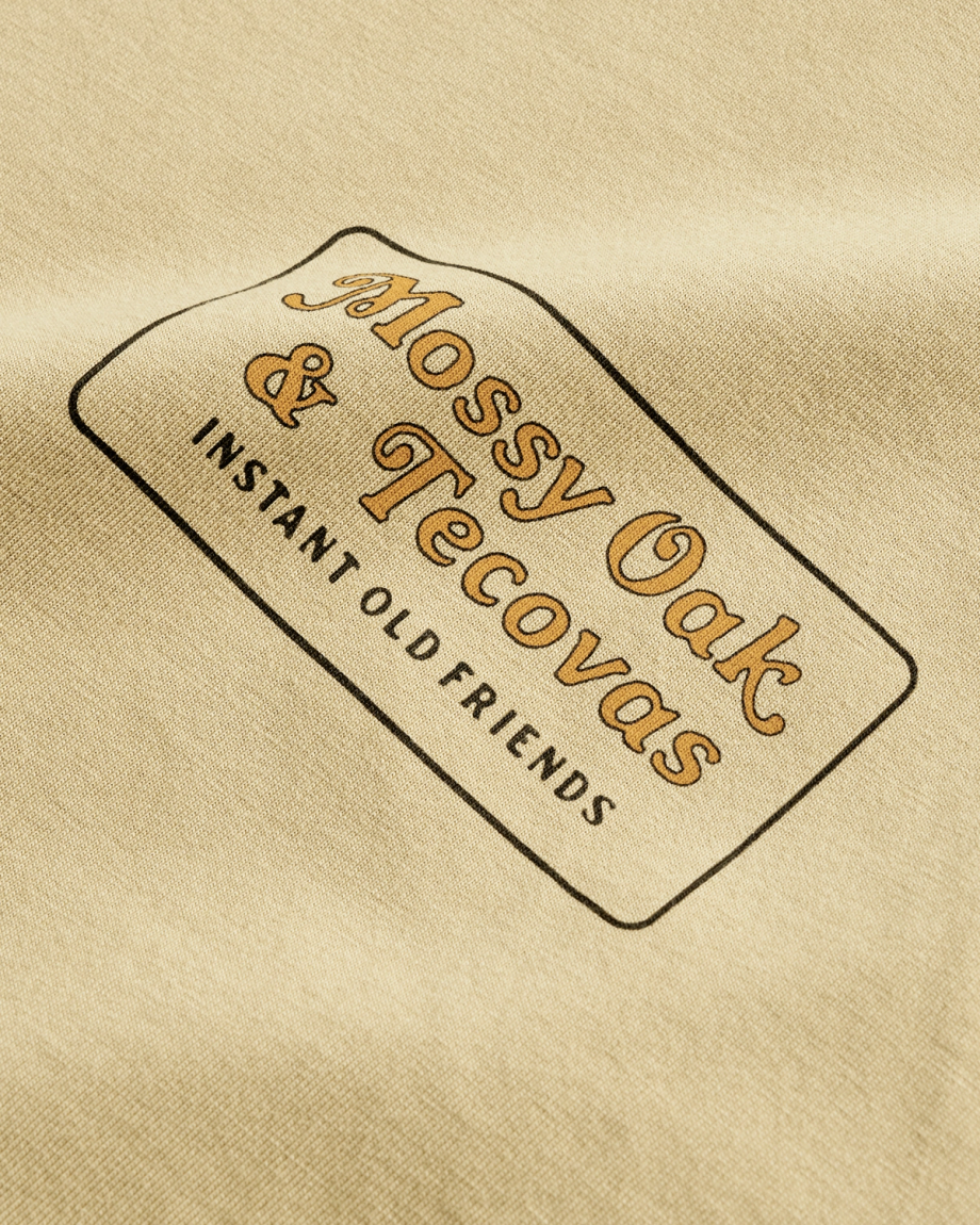 Closeup detail view of Men's Tecovas X Mossy Oak Instant Old Friends Tee - MO Original Bottomland