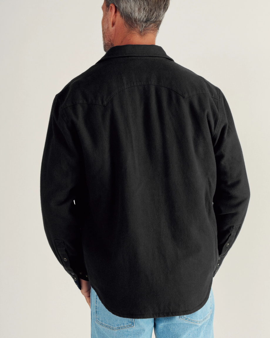 Closeup detail view of Men's Sawtooth Pearl Snap Shacket - Black