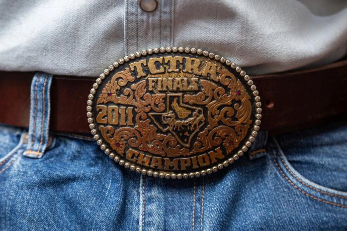 close up of TCTRA finals champion 2011 belt buckle