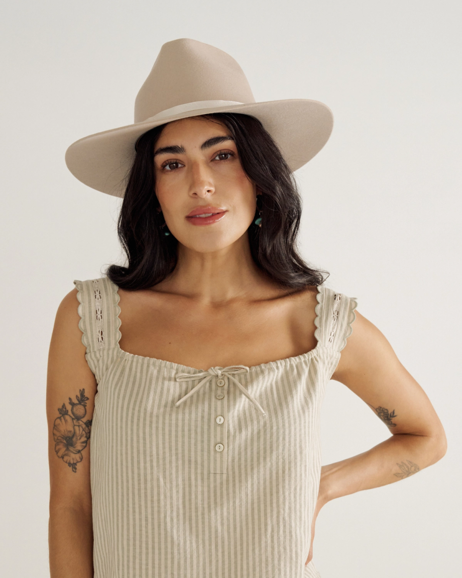 Front view of The Belle Wool Cowgirl Hat - Cream on model