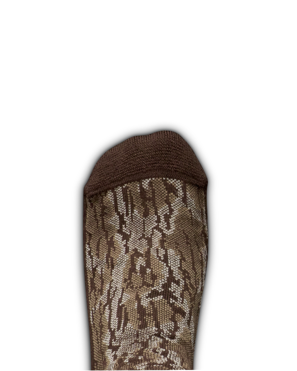 A close-up of the toe section of a brown and tan camouflage-patterned sock on a white background.