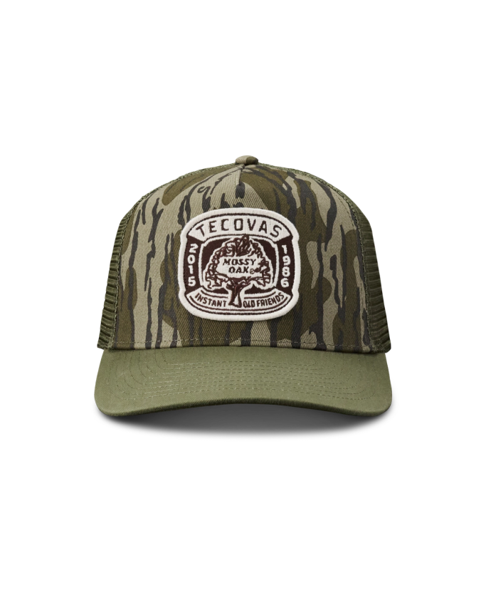 Front view of Tecovas x Mossy Oak Bottomlands Trucker - MO Original Bottomland on plain background