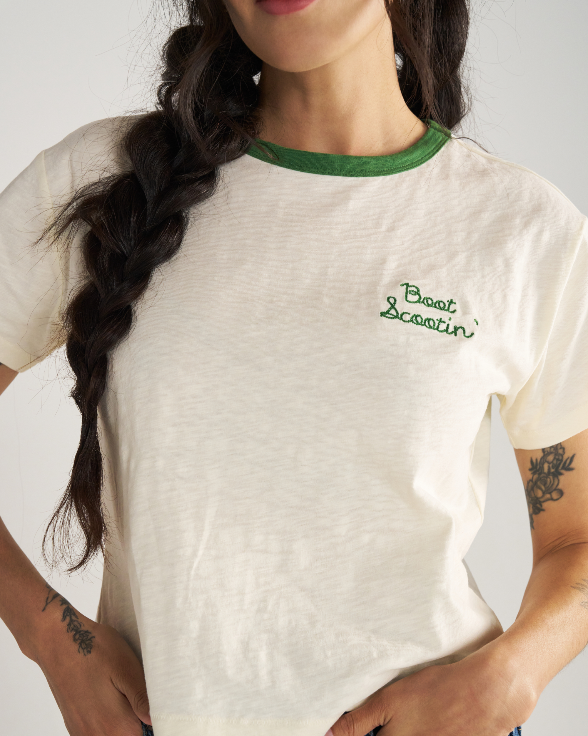 Closeup detail view of Women's Vintage Ringer Tee - Bone / Green