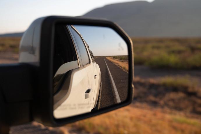 Picture of side view mirror in west texas landscape