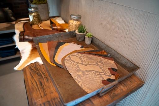 Image of the inside of the Rice Village Store showing leather samples