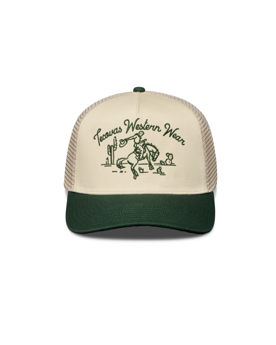 A beige and green trucker hat with "Texas Western Wear" and an illustration of a cowboy on a horse, with cacti in the background.