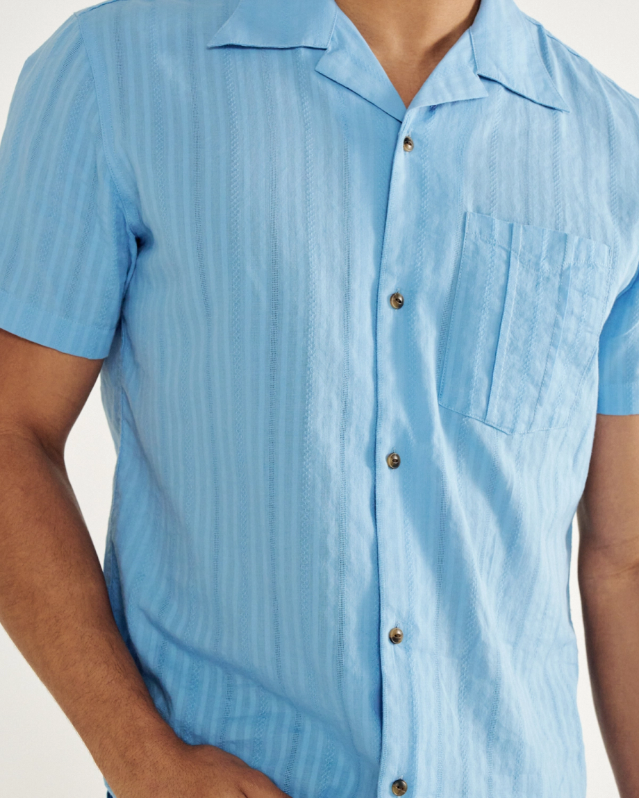 Closeup detail view of Men's Dobby Camp Short Sleeve Shirt - Light Blue