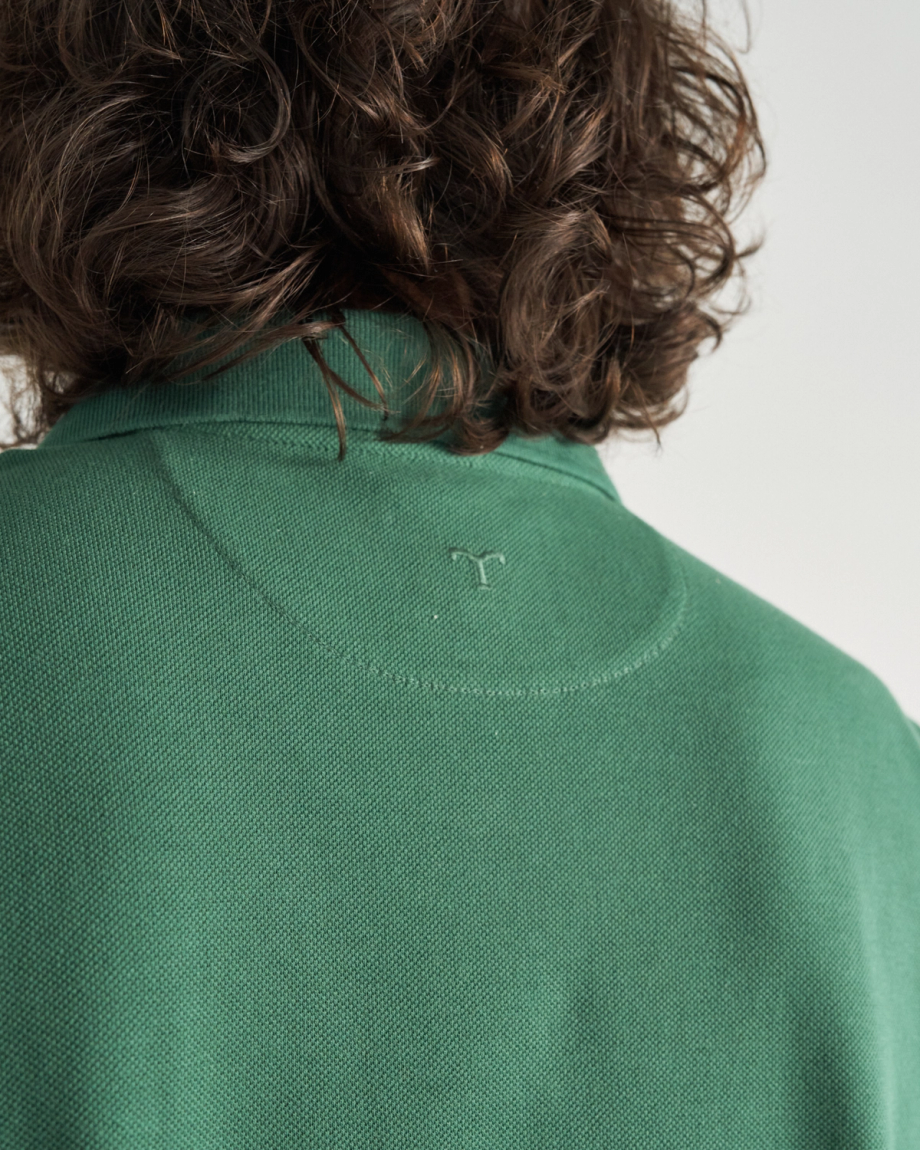 Closeup detail view of Men's Polo Short Sleeve Pearl Snap - Hunter Green