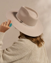 Back view of The Belle Wool Cowgirl Hat - Cream on model