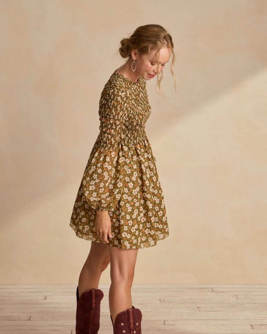side view of The Emma Dress by Kristopher Brock - Olive/Beige Floral Cotton Blend on plain background