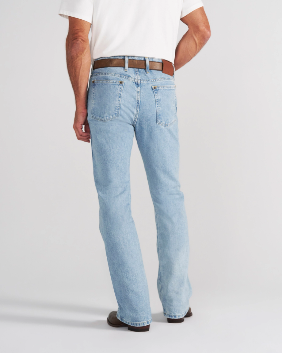A man seen from behind wearing a white polo shirt, a brown belt, and light-wash blue jeans.