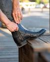 close up of Zane Midnight Black Zip Cowboy Boot on a man's feet 