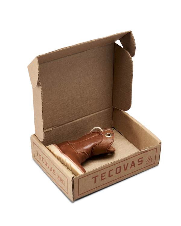 Inside view of LongHaul Roper Work Boot Ornament - Saddle on plain background