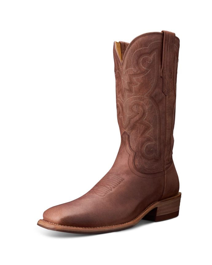 Brown cowboy boot with intricate stitching and a stacked heel, displayed on a black background.