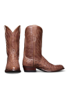 A pair of brown leather cowboy boots. The left boot is positioned upright, and the right boot is placed with the sole facing left.