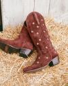 Burgundy cowboy boots.