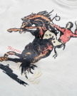 Illustration of a rider on a bucking horse, printed on white fabric, with the word "Tecovas" written in red near the bottom left.