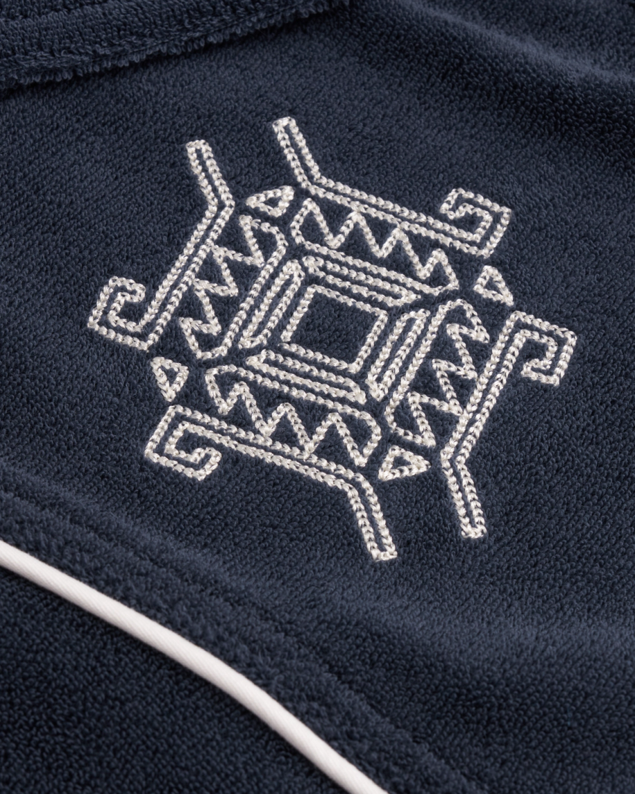Closeup detail view of Men's Terry Pearl Snap - Navy