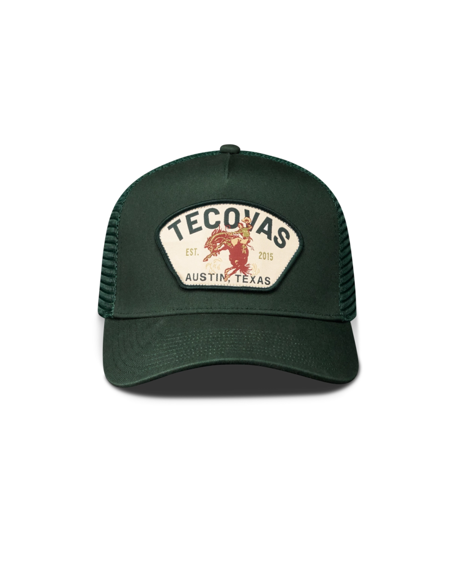 Front view of Tecovas Buckin Bronc 5 Panel High Pro Trucker - Forest Green on plain background