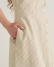 Front view of Women's Eyelet Linen Midi Dress - Green / White on model