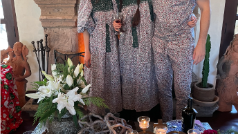 Family standing and hugging in Christmas Pajamas