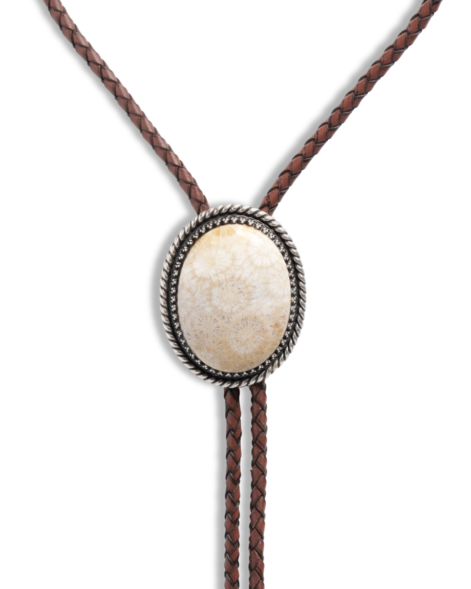 Closeup detail view of Iron Lamb Fossilized Coral Bolo - Cream / Black